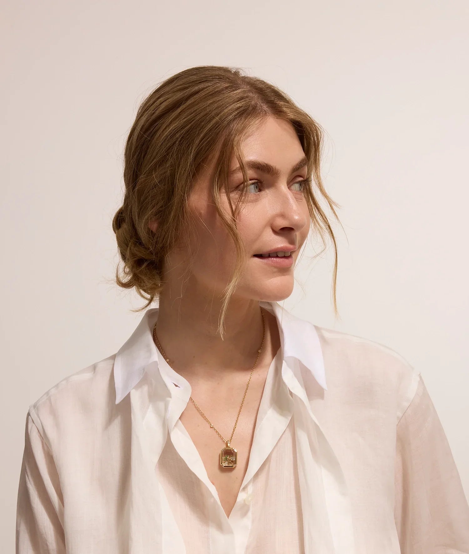 Quattro Baguette Locket 18K